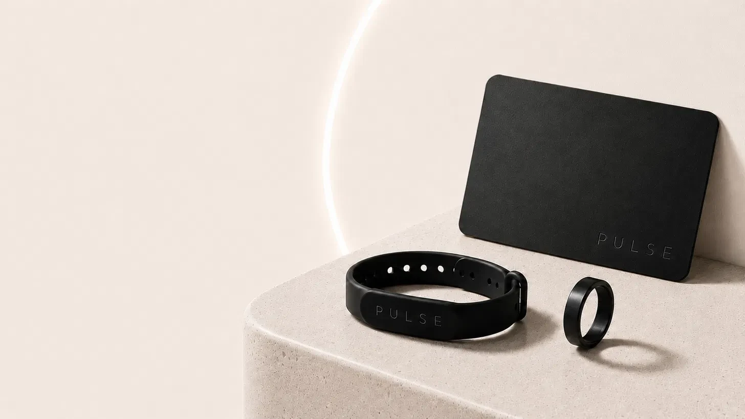 Pulse card, bracelet, and ring on a stone pedestal